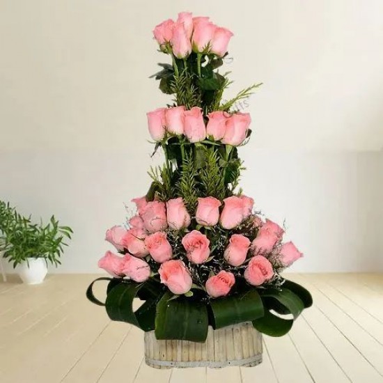 Beautiful Basket of Pink Roses with Leaves