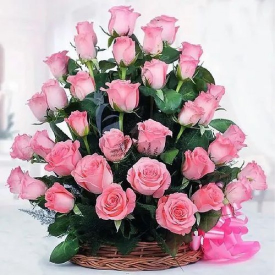 Bright Baskets of Long Stemmed Pink Roses with a Bow