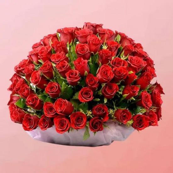 Mesmerizing Display of Red Roses with Greens in Basket